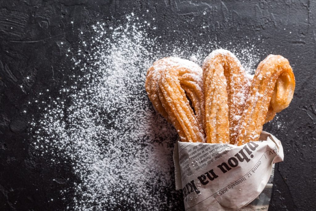 churros-sweet-breads-on-black-surface