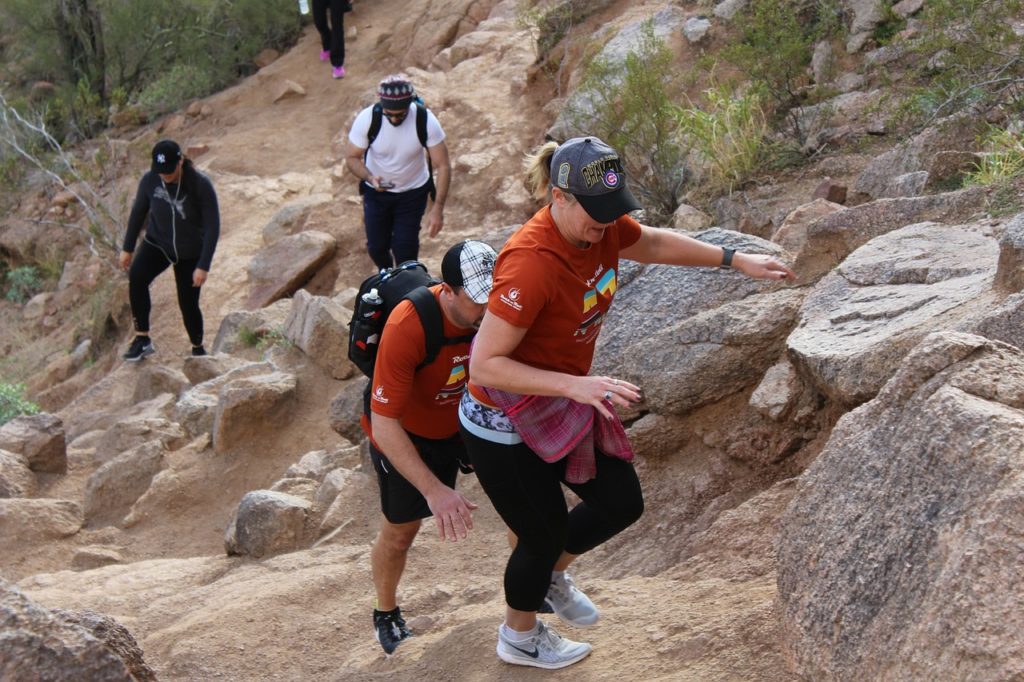 people hiking up arizona national park