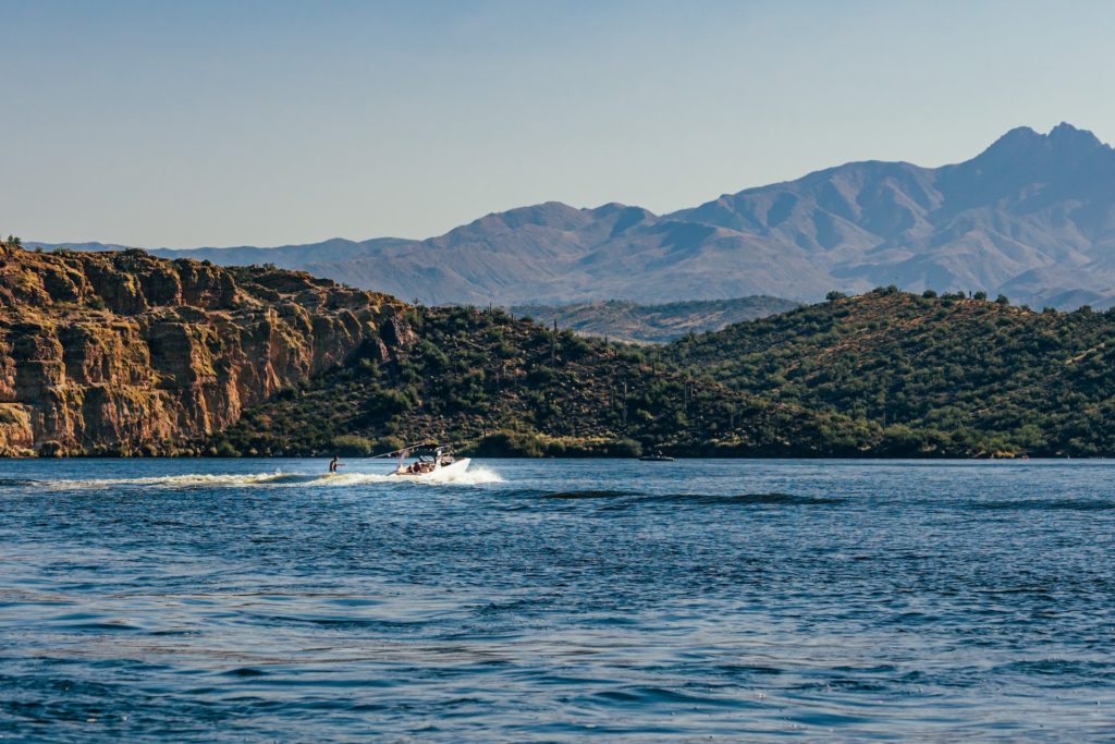 boat with jetski on saguaro lake arizona